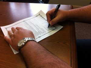 photo - contract signers by Dan Moyle
